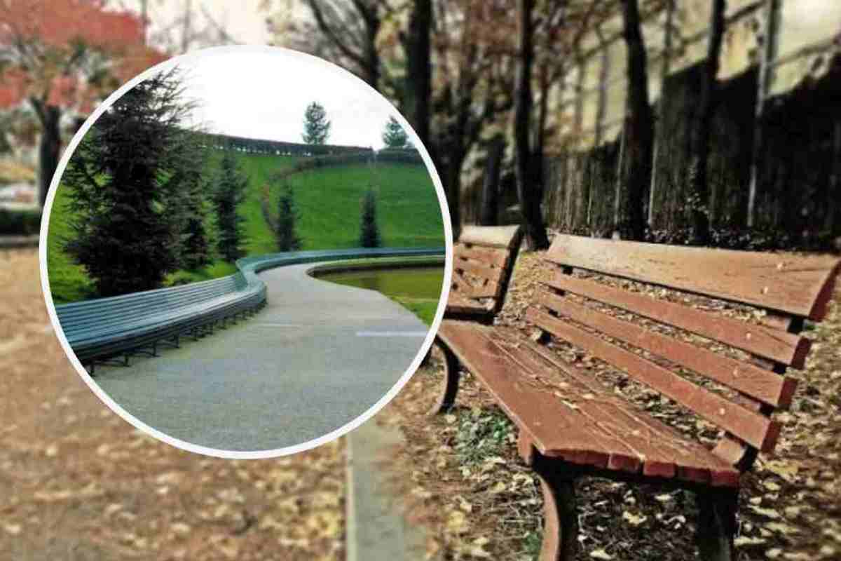 Una panchina di legna in un parco e in evidenza la panchina lunga duecento metri a Milano