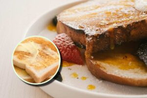 Un toast in un piatto e, in evidenza, del pane in cassetta tostato