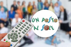 logo upas e telecomando in mano